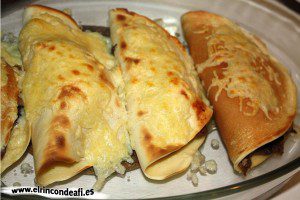 Crepes con champiñones y langostinos, gratinar al horno
