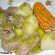 Costillas de cerdo con papas, piñas y mojo de cilantro