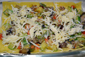 Lasaña de verduras, añadir el queso rallado