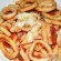 Macarrones con salsa arrabiata y calamares fritos