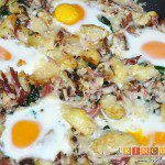 Frittata con papas, setas variadas, espinacas, codillo, queso Gruyère y huevos al horno