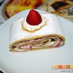 Brazo de gitano relleno de nata y fresa