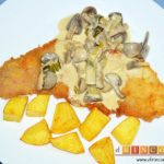 Empanado de cerdo con salsa de champiñones