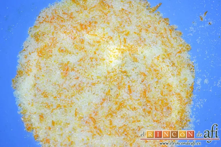 Rosquillas de naranja y queso, mezclar el azúcar con ralladura de naranja