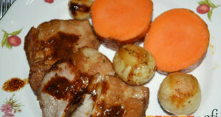Bondiola al horno con batata y cebollitas canarias asadas